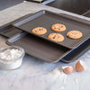Cookie Sheets with fresh baked cookie