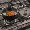 Artistry Sauce Pan 3 Quart preparing soup in lifestyle setting