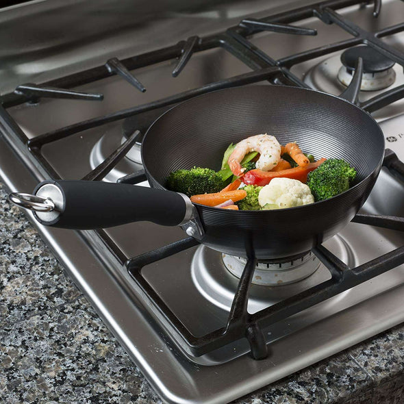 8 Inch Wok displaying stir-fry on a gas burning stove