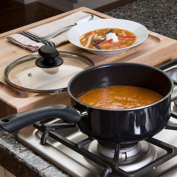 Artistry Sauce Pan 3 Quart preparing soup in lifestyle setting