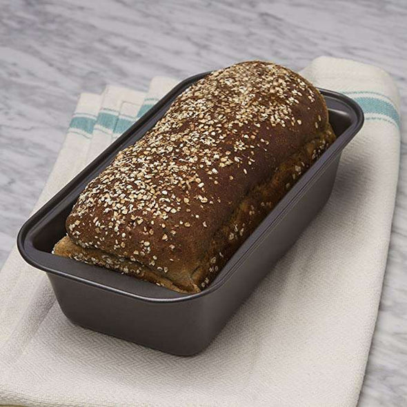BakeIns Large Non-Stick Loaf Pan on countertop with bread