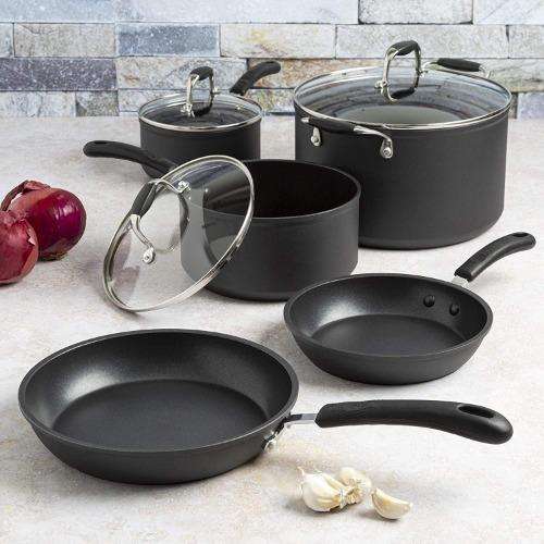 Symphony Premium Forged Non-Stick Cookware Set on counter top next to food